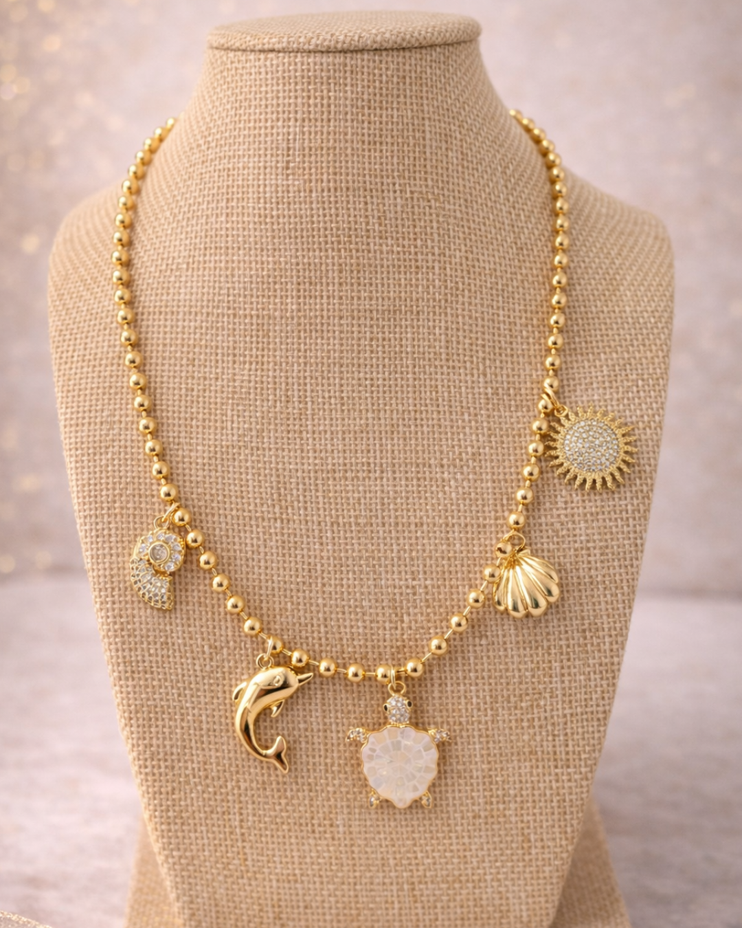 Cadeja con multiples dijes